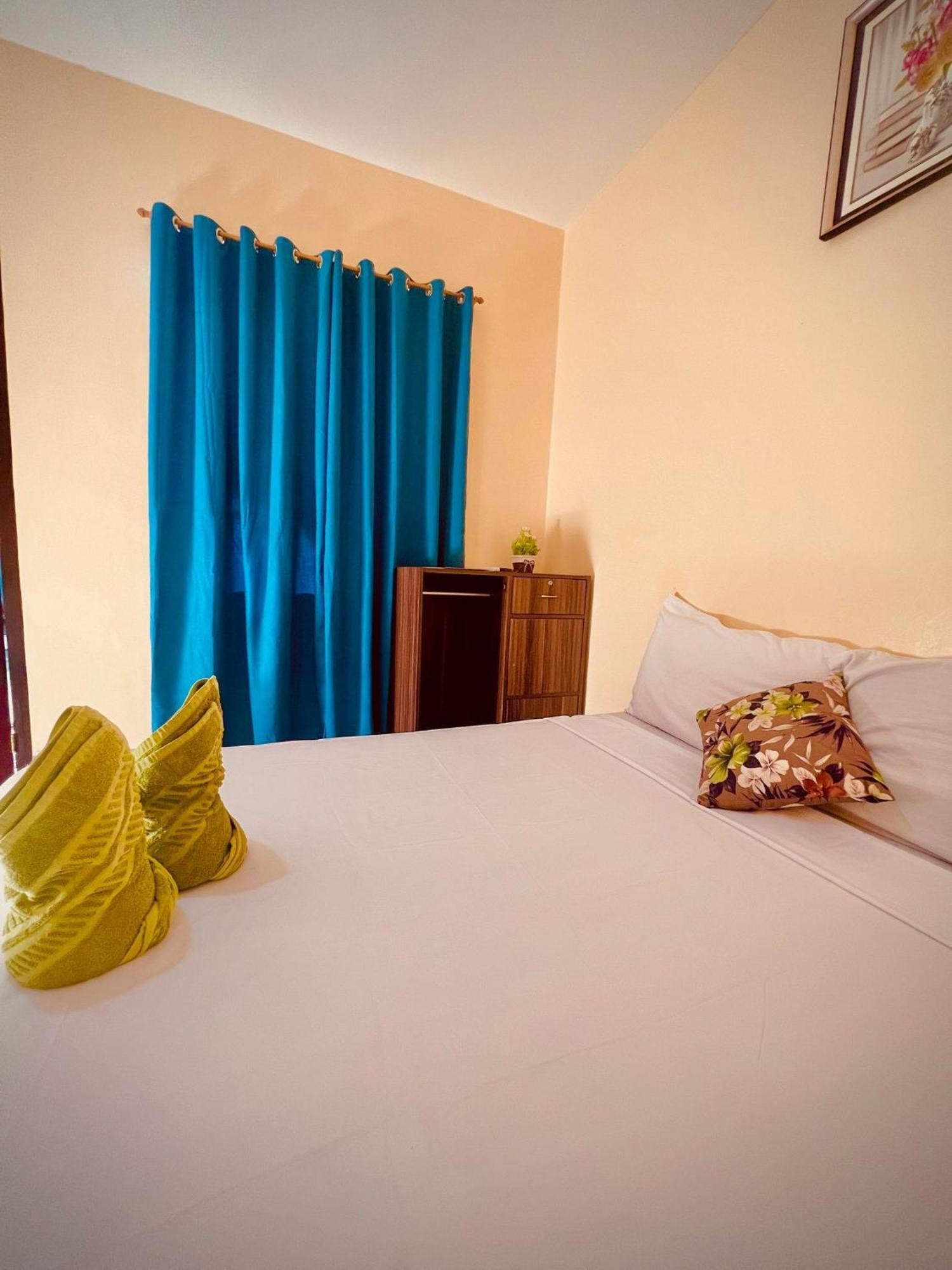 Indino Guesthouse Moalboal Buitenkant foto