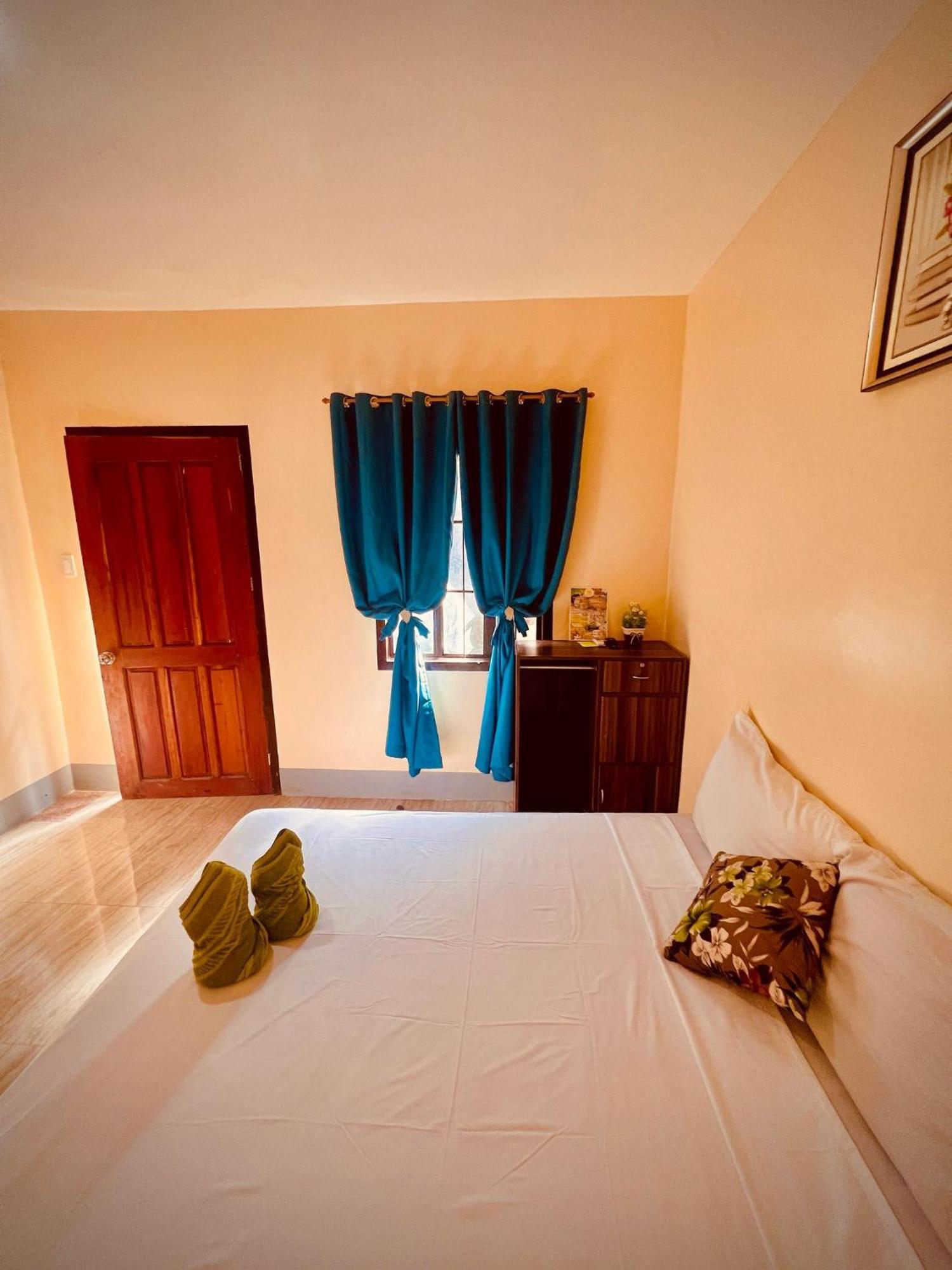 Indino Guesthouse Moalboal Buitenkant foto